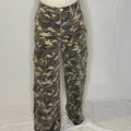Camouflage pants on a mannequin against a white background