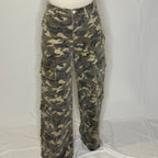 Camouflage pants on a mannequin against a white background