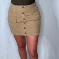 Beige corduroy skirt with button details on a plain background