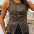 Woman wearing a leopard print sleeveless top in a living room setting